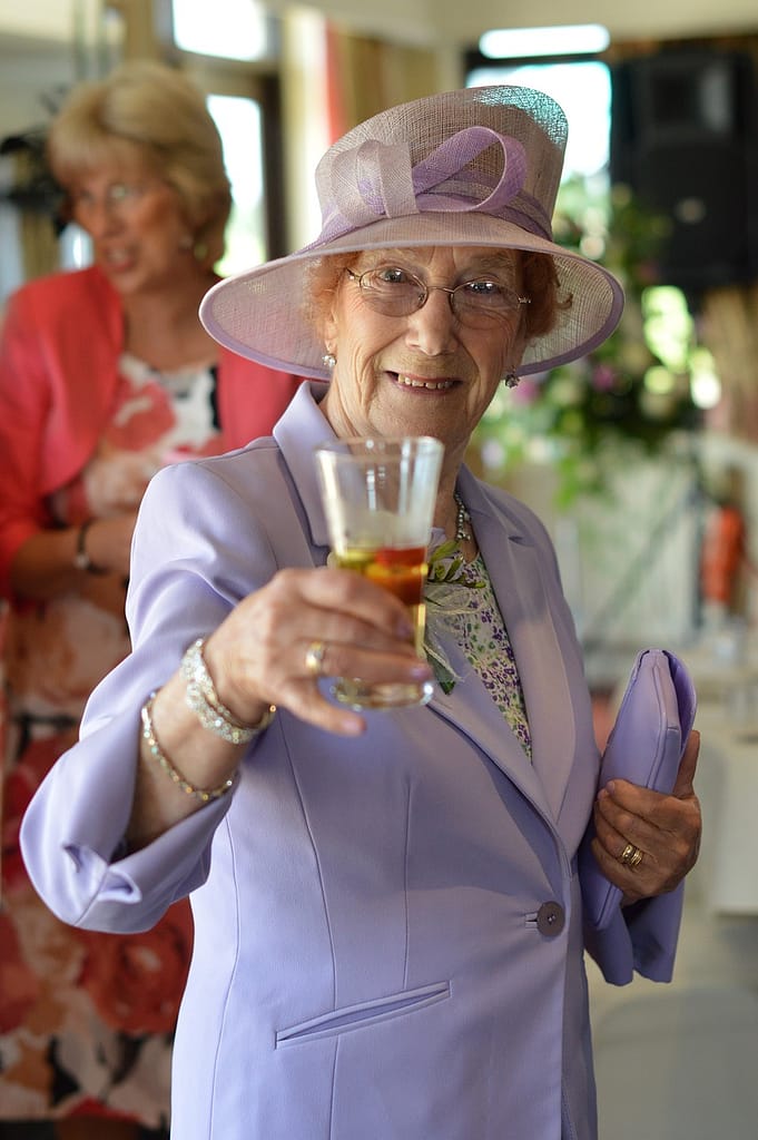 lady, cheers, drink, wedding, reception, hat, happy, glass, alcohol, smile, beautiful woman, people, celebration, cheerful, smiling, wine, person, woman, happiness, party, lifestyle, toast, glamour, event, holding, new, year, celebrating, champagne, dress, elegant, success, female, evening, luxury, elegance, gorgeous, celebrity, congratulating, glamorous, high, looking, society, sparkling, reception, toast, toast, toast, toast, toast, society, society